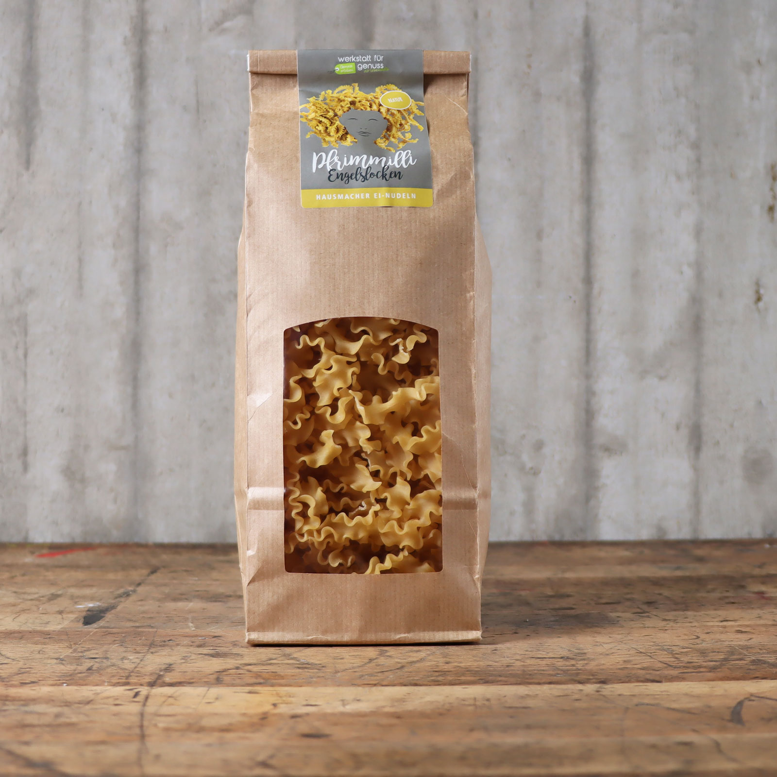 Die Engelslocken der Werkstatt für Genuss vor einem Ambiente-Hintergrund