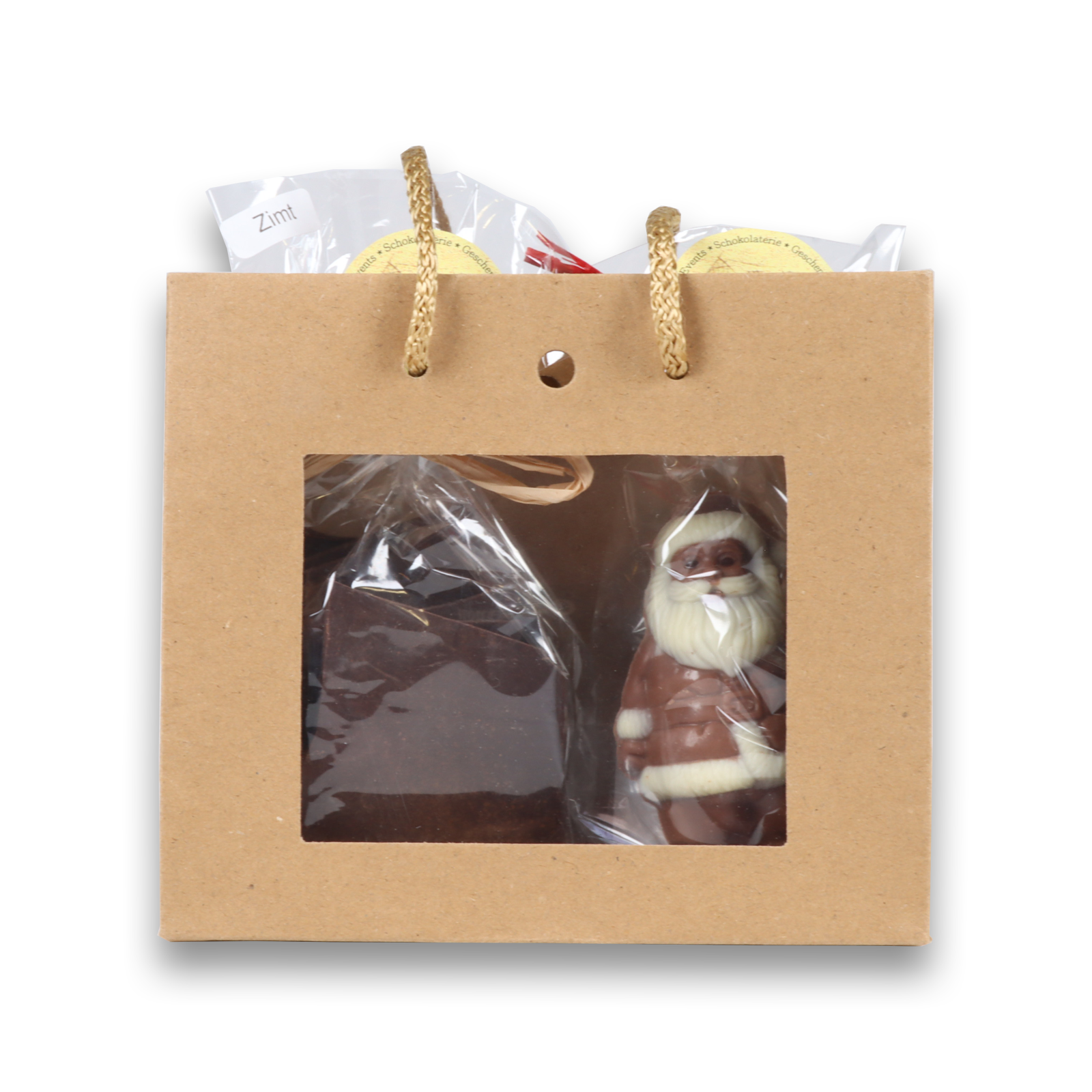 Kleiner Weihnachtsmann und Zartbitterschokolade in der Tüte
