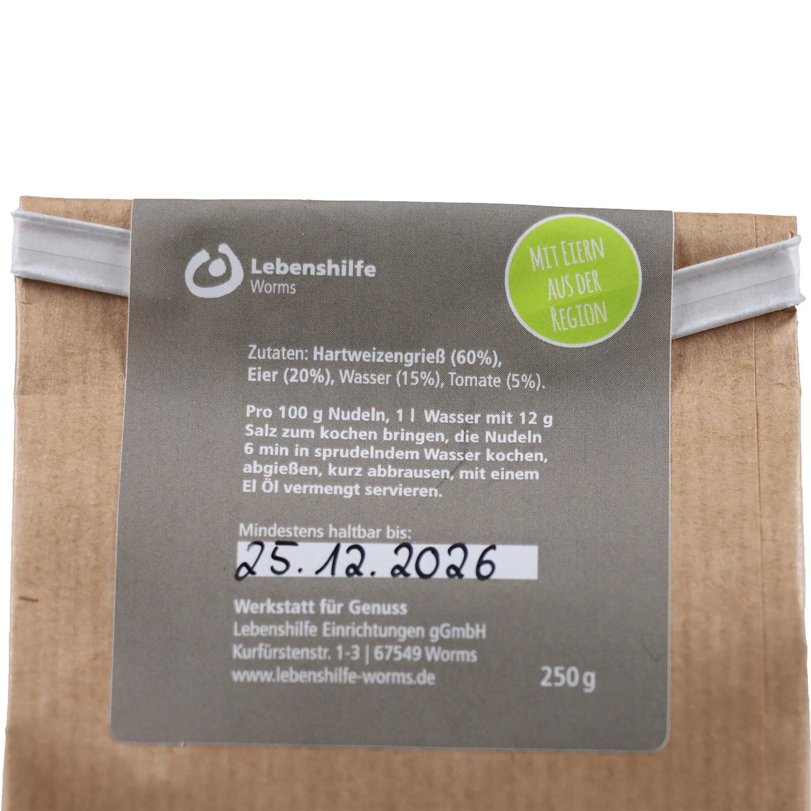 Zutatenliste der Spirelli Tomate bestehend aus Hartweizengrieß (60%), Eier (20%), Wasser (15%) und Tomate (5%)