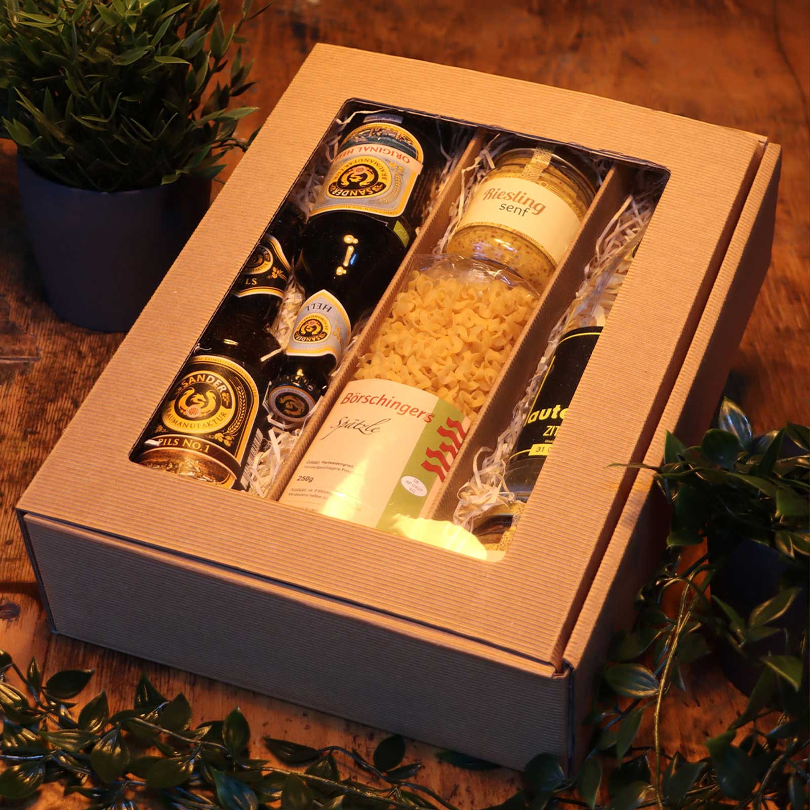 Die Bier Box gefüllt mit einer Auswahl von Bieren und Produkten zum Genießen.
